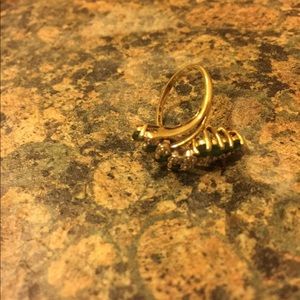 Silver ring with green diamonds